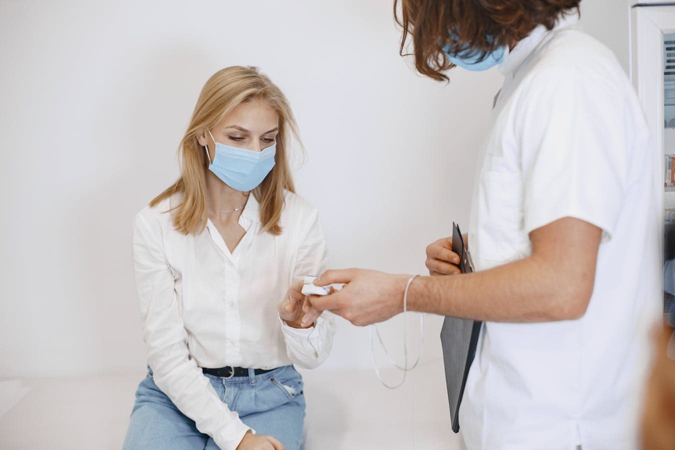 Patient preparing key questions before traveling abroad for treatment
